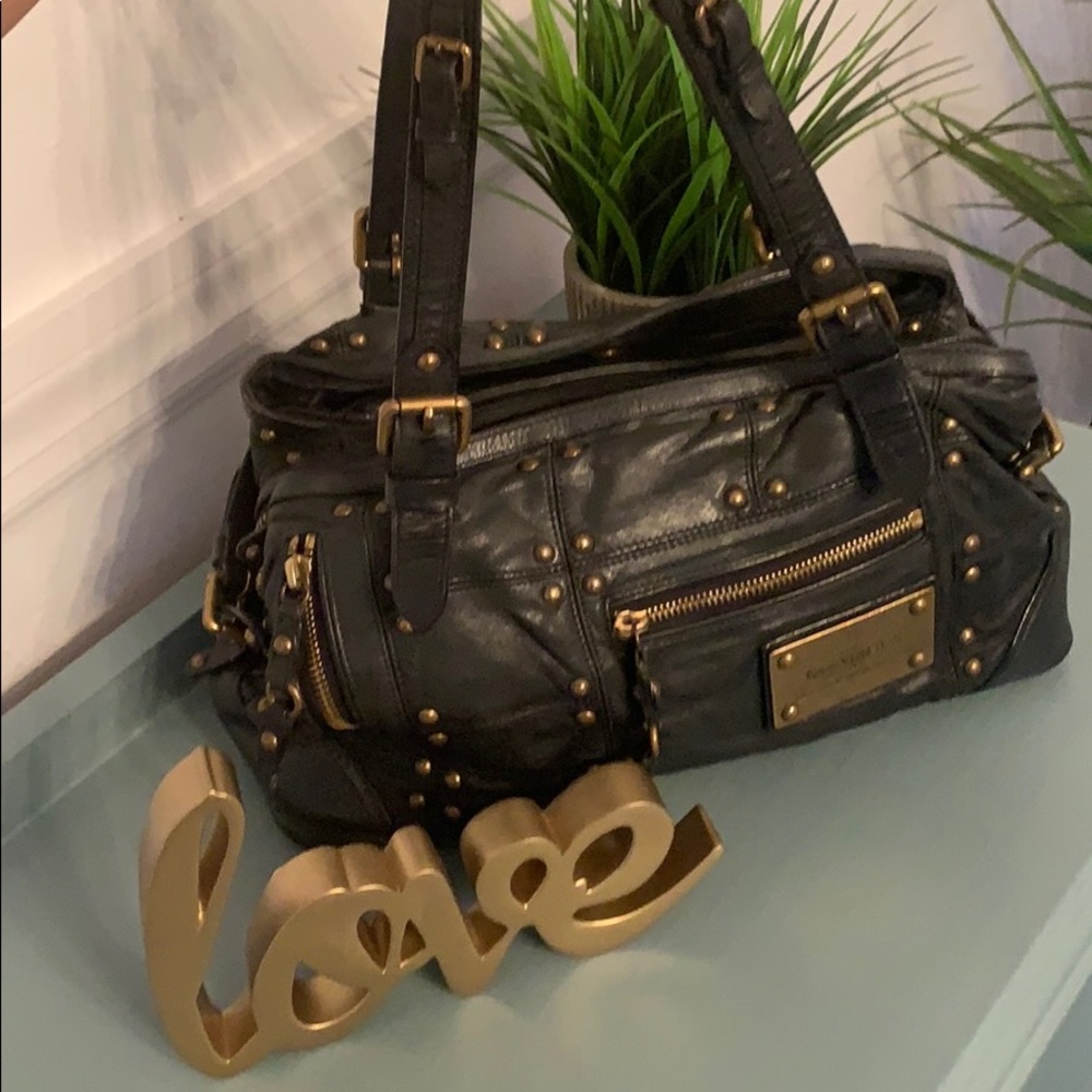 Louis Vuitton the Riveting black lamb skin purse